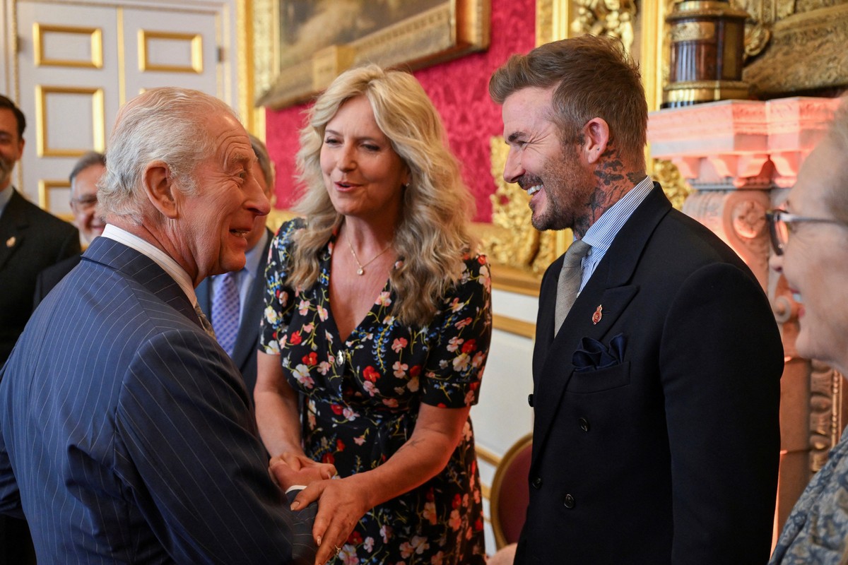 Britain's King Charles speaks with David Beckham and Penny Lancaster at the King's Foundation Awards ceremony, on the 35th anniversary of The King's Foundation, at St James's Palac ...