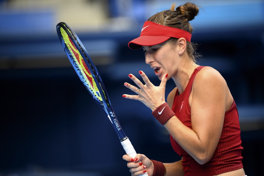 epa09375847 Belinda Bencic of Switzerland reacts after missing a point against Elena Rybakina of Kazakhstan during the women&#039;s singles tennis semifinal at the Tokyo 2020 Olympic Games, in Tokyo,  ...