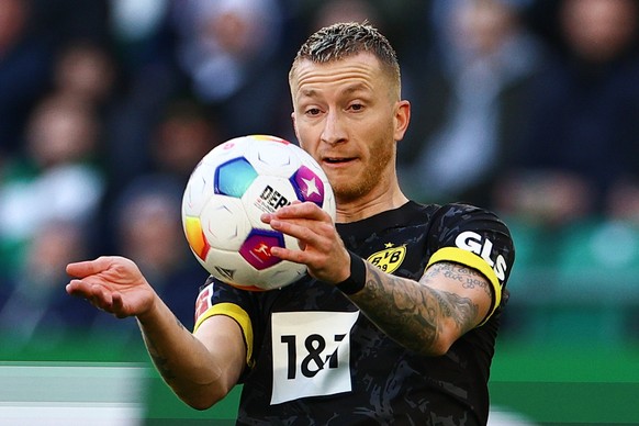 epa11161655 Wolfsburg ?s Kevin Paredes during a free kick Dortmund&#039;s Marco Reus in action during the Bundesliga soccer match between VFL Wolfsburg and Borussia Dortmund, in Wolfsburg, Germany, 17 ...