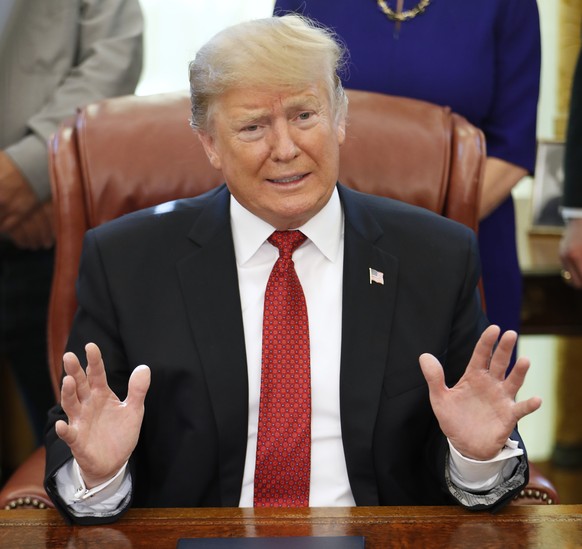 President Donald Trump speaks during a meeting with American manufacturers in the Oval Office of the White House, Thursday, Jan. 31, 2019, in Washington. Trump was signing an executive order pushing t ...