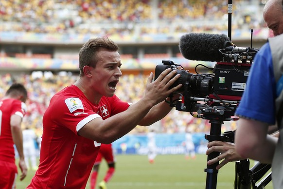 epa04281565 Xherdan Shaqiri -of Switzerland celebrates after scoring the 1-0 lead during the FIFA World Cup 2014 group E preliminary round match between Honduras and Switzerland at the Arena Amazonia  ...