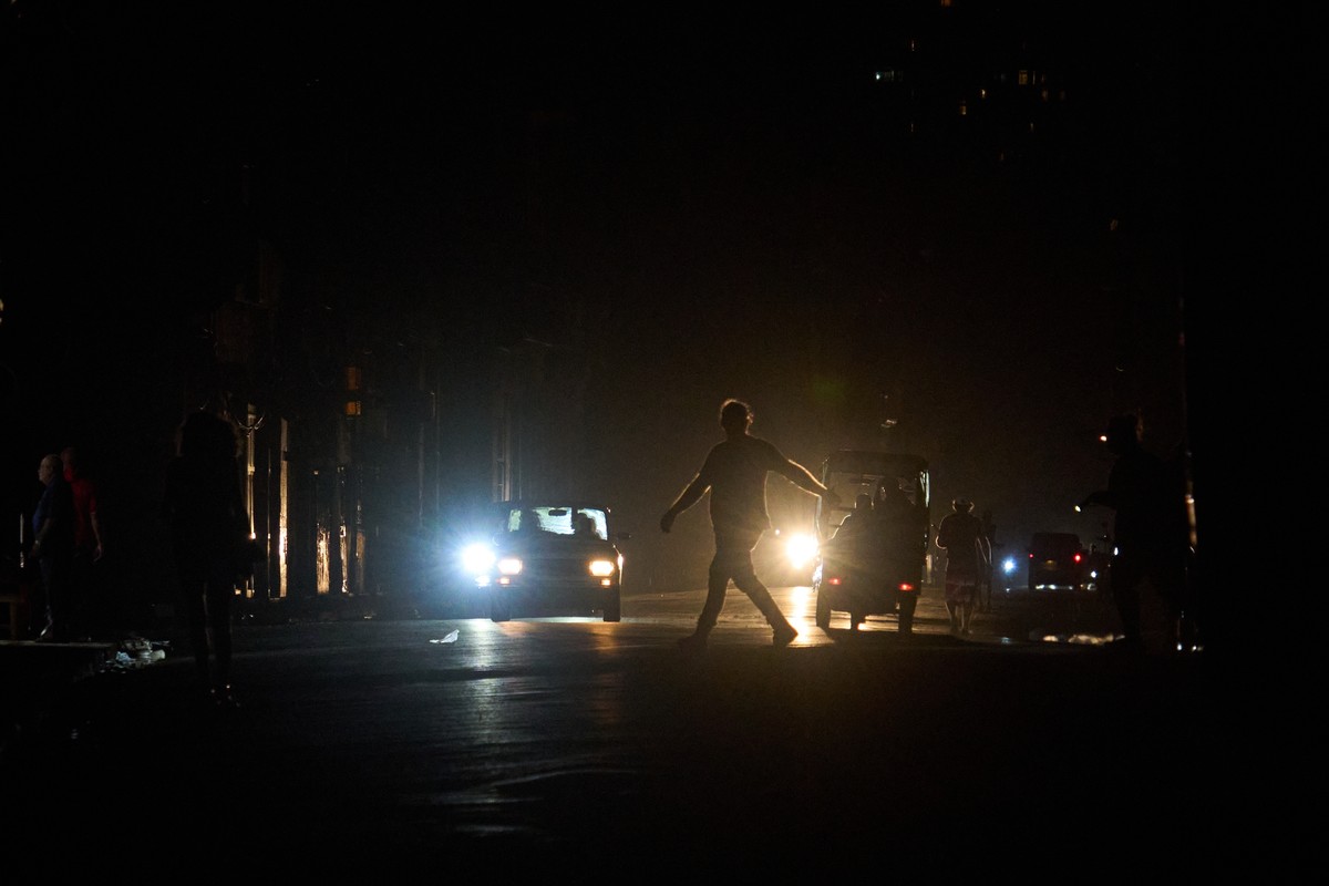 A man crosses a street during a blackout in Havana, Wednesday, March 4, 2026. (AP Photo/Ramon Espinosa)
Cuba Blackout