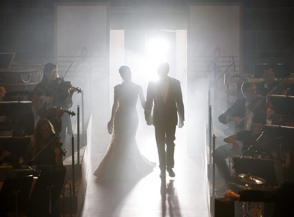 Crown Princess Victoria of Sweden and Daniel Westling, walk onto the stage at the end of the Swedish Parliament&#039;s concert at the Royal Concert Hall in Stockholm, Sweden, Friday June 18, 2010. Cro ...