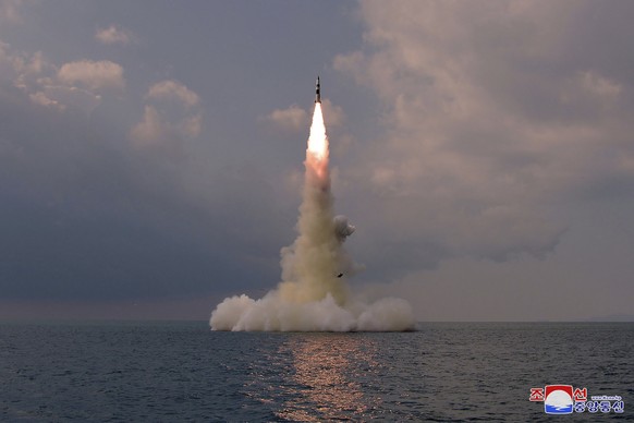 This photo provided by the North Korean government shows a ballistic missile launched from a submarine Tuesday, Oct. 19, 2021, in North Korea. North Korea announced Wednesday, Oct. 20, 2021 that it ha ...