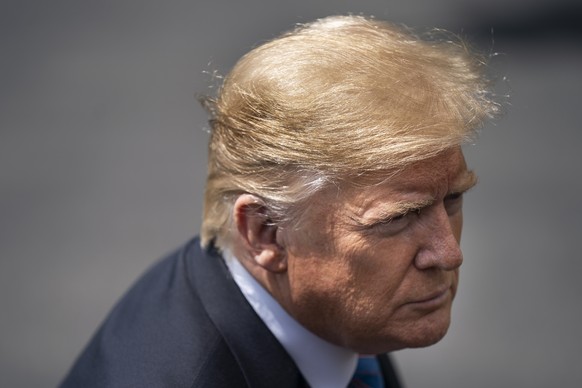 epa07570177 US President Donald J. Trump speaks to the media about China tariffs and the tensions with Iran, as he departs the White House for events in Louisiana, in Washington, DC, USA, 14 May 2019. ...