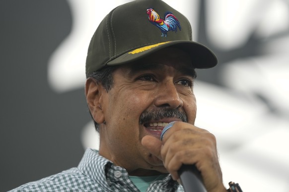 Venezuelan President Nicolas Maduro speaks to young members of the United Socialist Party during an event marking the youth wing of the party&#039;s 16th anniversary in Caracas, Venezuela, Thursday, S ...