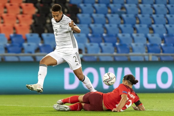 epa08651407 Germany&#039;s Thilo Kehrer, left, fights for the ball against Switzerland&#039;s Ricardo Rodriguez, right, during the UEFA Nations League group 4 soccer match between Switzerland and Germ ...