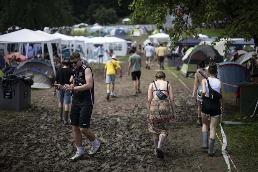 Visitors pictured at the Openair St. Gallen, on Friday, June 28, 2024, in St. Gallen, Switzerland. The festival will take place until Sunday, June 30, 2024. (KEYSTONE/Gian Ehrenzeller)