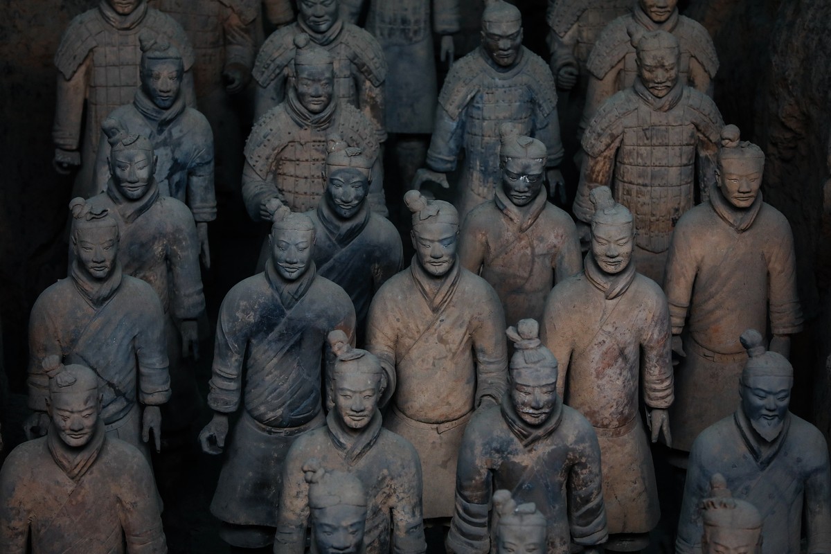 epa07048803 Terracotta Warriors stand in partially unearthed pits at the Museum of Qin Terracotta Warriors and Horses, in Xi'an, the capital of Shaanxi Province, China, 26 September 2018. The Ter ...