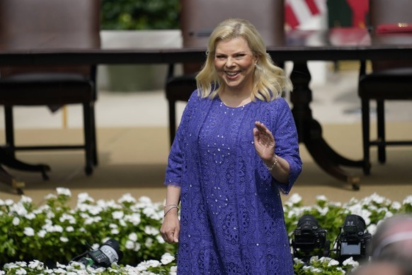 Sara Netanyahu waves as she arrives as United States President Donald J. Trump and First lady Melania Trump host a signing ceremony of the Abraham Accords on the South Lawn of the White House in Washi ...