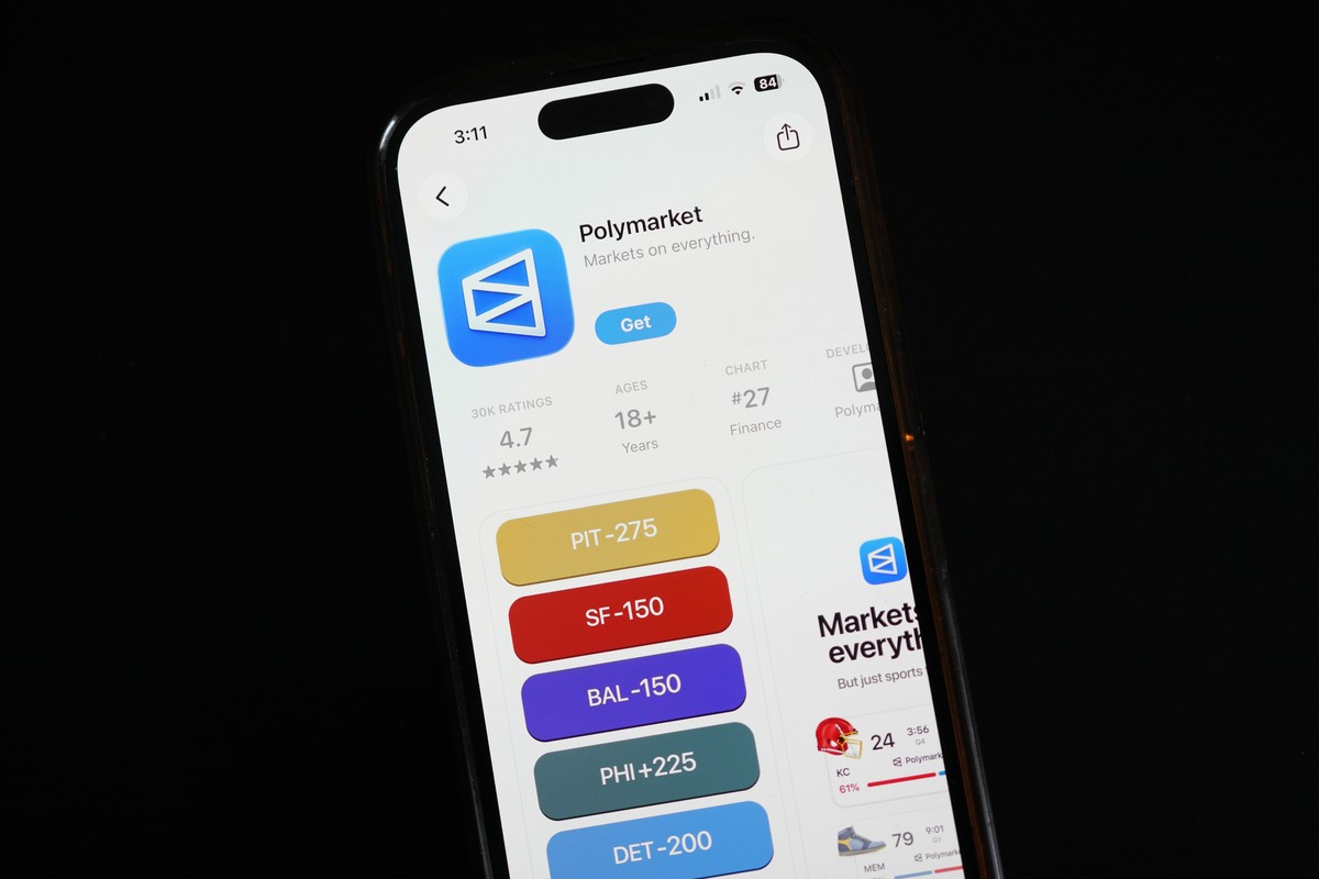 FILE - The prediction market app Polymarket is displayed on a mobile phone, April 16, 2026, in Chicago. (AP Photo/Erin Hooley, File)
Polymarket US Market