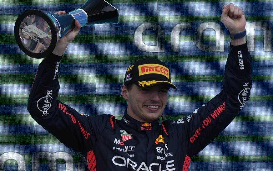 Red Bull driver Max Verstappen of the Netherlands celebrates on the podium after winning the British Formula One Grand Prix race at the Silverstone racetrack, Silverstone, England, Sunday, July 9, 202 ...