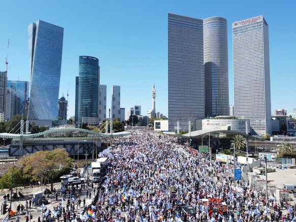 epa10511206 A picture taken with a drone shows protesters during a rally against the government justice system reform plan in Tel Aviv, Israel 09 March 2023. The protest leaders announced a national d ...