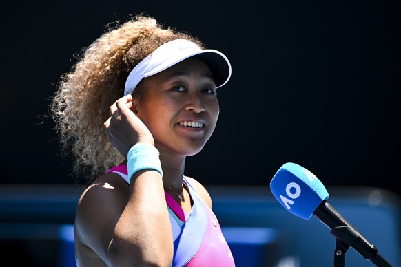 epaselect epa09690383 Naomi Osaka of Japan during a post match interview after defeating Camila Osorio of Colombia in their first round match on Day 1 of the Australian Open tennis tournament, at Melbourne Park, in Melbourne, Australia, 17 January 2022.  EPA/DAVE HUNT AUSTRALIA AND NEW ZEALAND OUT