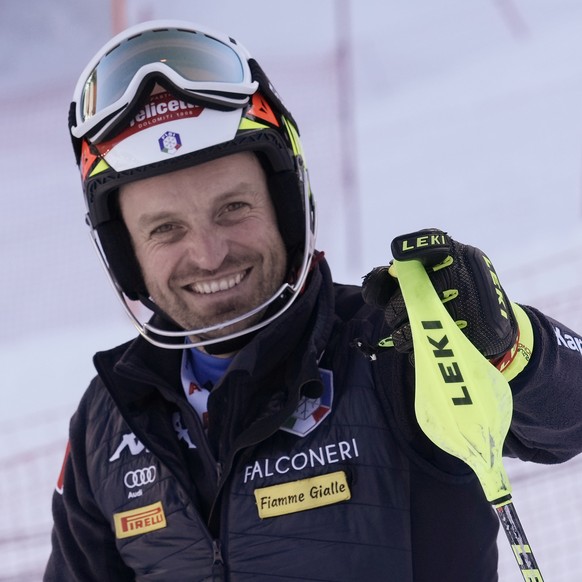 Italy&#039;s Manfred Moelgg inspects the course of an alpine ski, men&#039;s World Cup slalom race, in Flachau, Austria, Wednesday, March 9, 2022. (AP Photo/Giovanni Auletta)