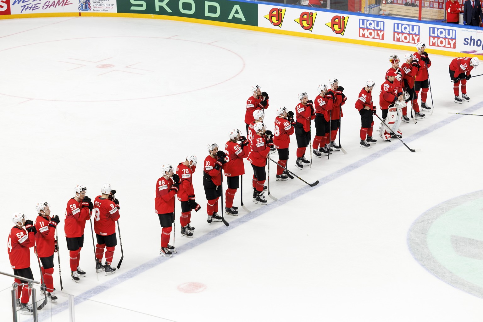 Switzerland&#039;s players look disappointed after losing against the team Germany, during the IIHF 2023 World Championship quarter final game between Switzerland and Germany, at the Riga Arena, in Ri ...