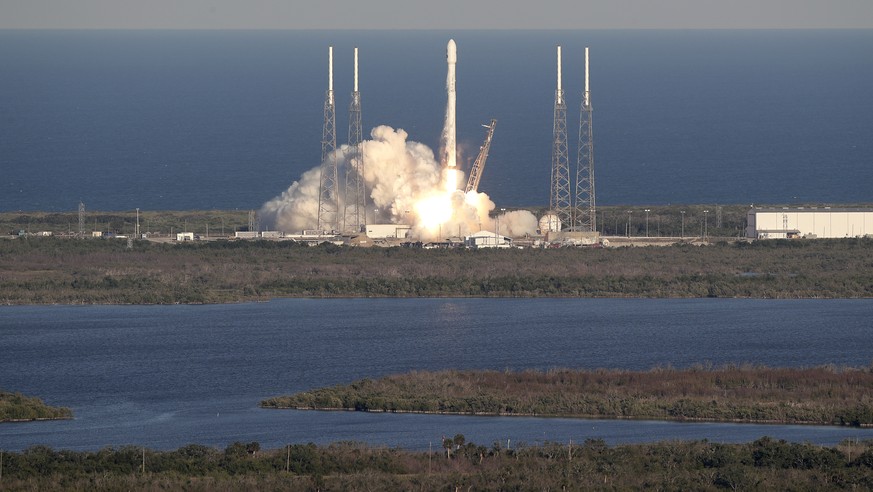 A SpaceX Falcon 9 rocket transporting the Tess satellite lifts off from launch complex 40 at the Cape Canaveral Air Force Station in Cape Canaveral, Fla., Wednesday, April 18, 2018. The satellite know ...