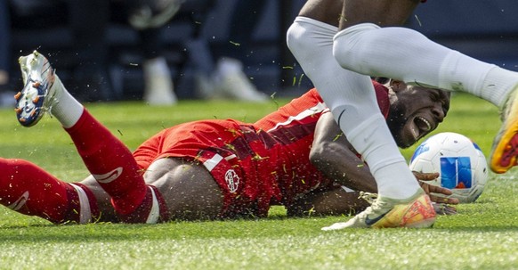 2025 CONCACAF Nations League: Canada 2:1 United States - 23 Mar 2025 United States Patrick Agyemang 16 and Canadas Alphonso Davies 19 vie for the ball during the CONCACAF Nations League Third Place Ma ...