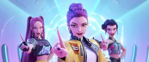 This image released by Netflix shows characters, from left, Mira, Rumi, Zoey in a scene from &quot;KPop Demon Hunters.&quot; (Netflix via AP)
Music-KPop Demon Hunters