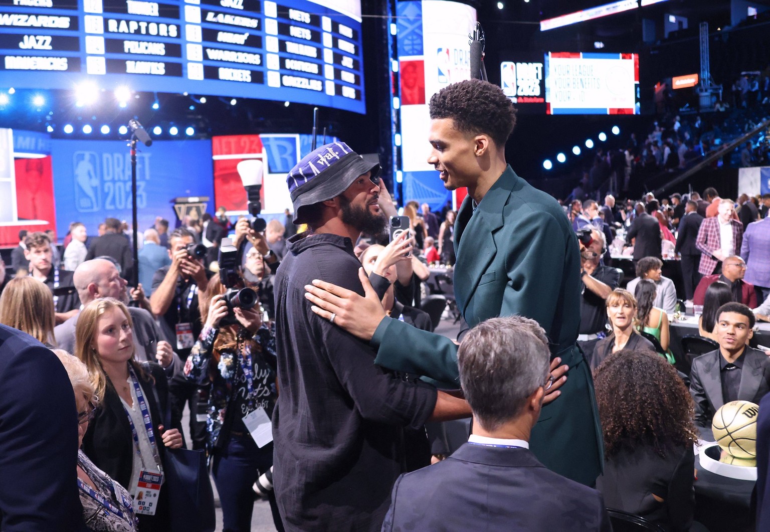 Victor Wembanyama Picked No. 1 Overall by Spurs - NYC French basketball players Victor Wembanyama and Joakim Noah talking together around the Green Room during the NBA, Basketball Herren, USA Draft at ...