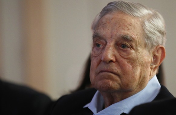 George Soros, Founder and Chairman of the Open Society Foundations listens to the conference after his speech entitled &quot;How to save the European Union&quot; as he attends the European Council On  ...