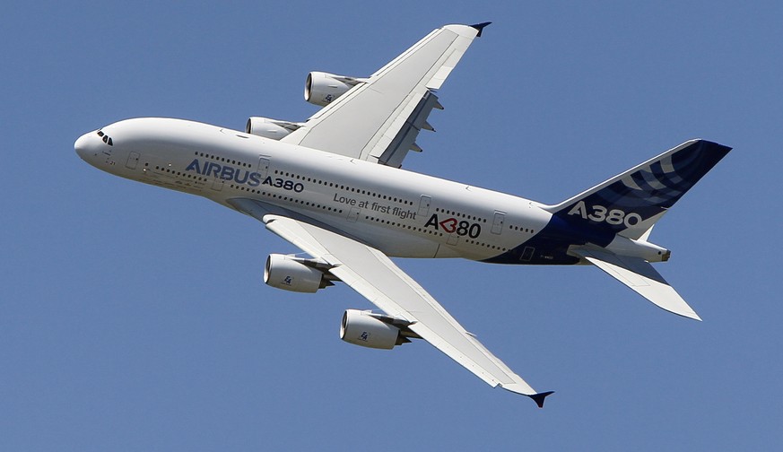 FILE - In this June 26, 2011, file photo, an Airbus A380 performs during a demonstration flight at the 49th Paris Air Show at Le Bourget airport, east of Paris. Airbus said Thursday, Feb. 14, 2019 it  ...