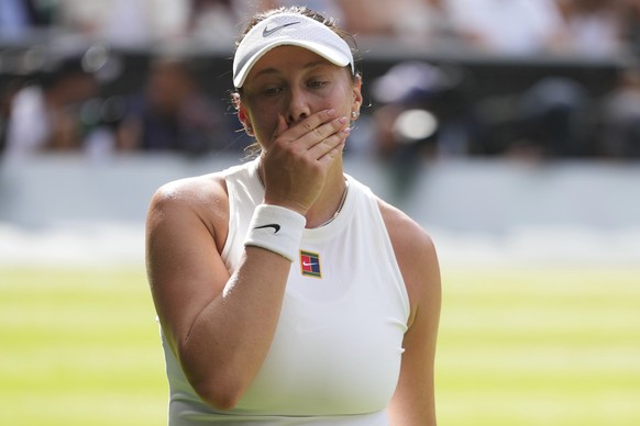 Amanda Anisimova of the U.S. reacts during the women's singles final match against Iga Swiatek of Poland at the Wimbledon Tennis Championships in London, Saturday, July 12, 2025.(AP Photo/Kirsty ...