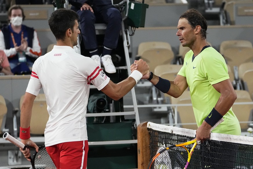 FILE - Serbia&#039;s Novak Djokovic, left, shakes hands with Spain&#039;s Rafael Nadal after their semifinal match of the French Open tennis tournament at the Roland Garros stadium, Friday, June 11, 2 ...