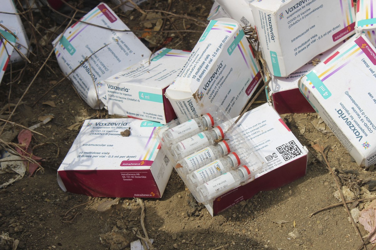 Expired COVID-19 vaccines are set to be destroyed by government officials in Abuja, Nigeria. Wednesday, Dec. 22, 2021. Nigeria destroyed more than 1 million expired doses of AstraZeneca's COVID-1 ...