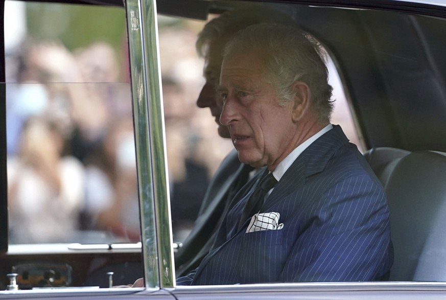 King Charles III returns to Clarence House, London, after he was formally proclaimed monarch by the Privy Council, Saturday Sept. 10, 2022. (Zac Goodwin/PA via AP)