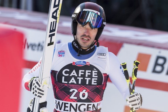 Gilles Roulin from Switzerland reacts in the finish area during the men&#039;s downhill race at the Alpine Skiing FIS Ski World Cup in Wengen, Switzerland, Saturday, January 13, 2018. (KEYSTONE/Peter  ...