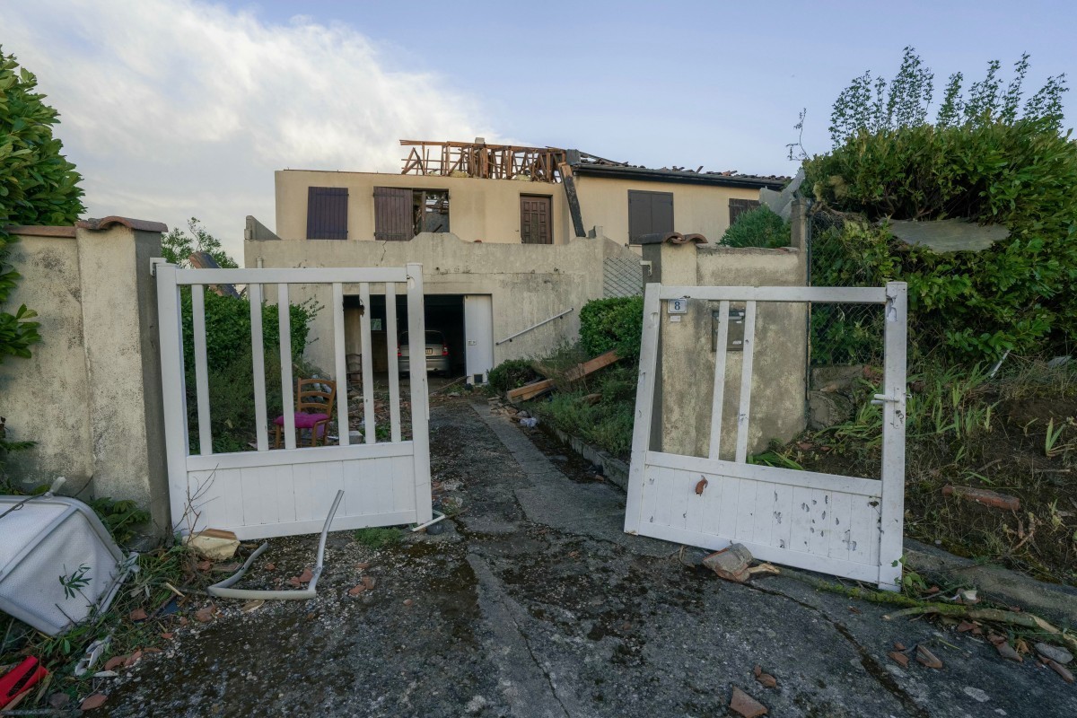 This photograph taken on August 24, 2026, shows damaged houses after a tornado struck Pomas, southwestern France. A tornado struck the Aude department on August 24 as part of southwestern France remai ...