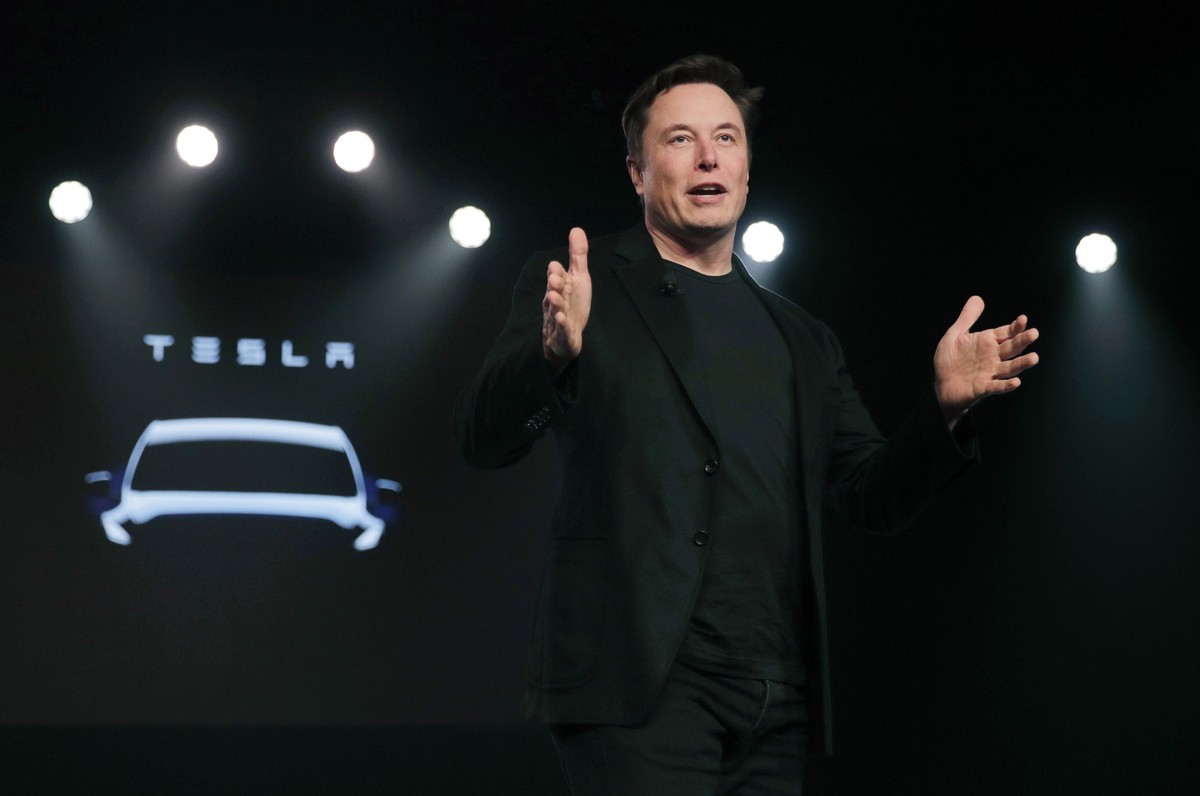 FILE- Tesla CEO Elon Musk speaks before unveiling the Model Y at Tesla's design studio March 14, 2019, in Hawthorne, Calif. A Florida judge ruled Friday, Nov. 17, 2023, that a jury should decide  ...