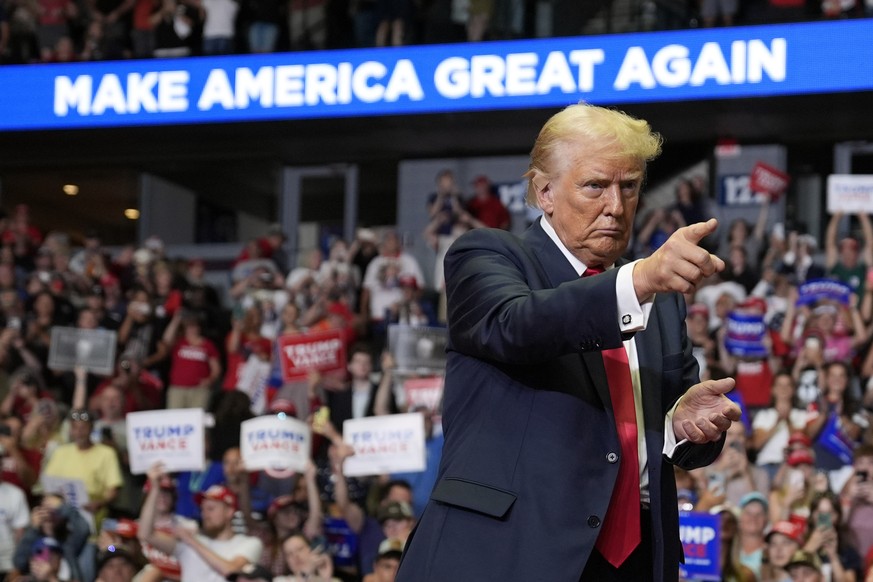 Republican presidential candidate former President Donald Trump reacts after speaking at a campaign rally, Saturday, July 20, 2024, in Grand Rapids, Mich. (AP Photo/Evan Vucci)