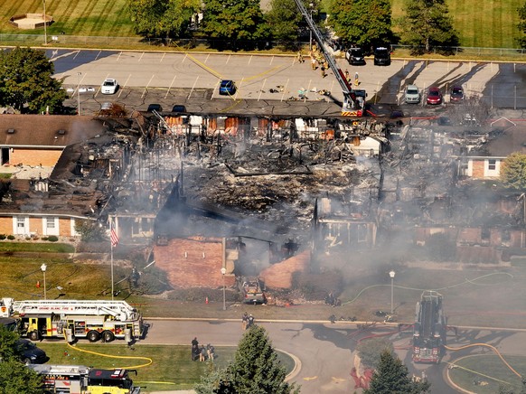 Emergency crews respond to a shooting and fire at The Church of Jesus Christ of Latter-day Saints, in Grand Blanc, Mich., Sept. 28, 2025. (David Guralnick/Detroit News via AP)
APTOPIX Church Shooting  ...