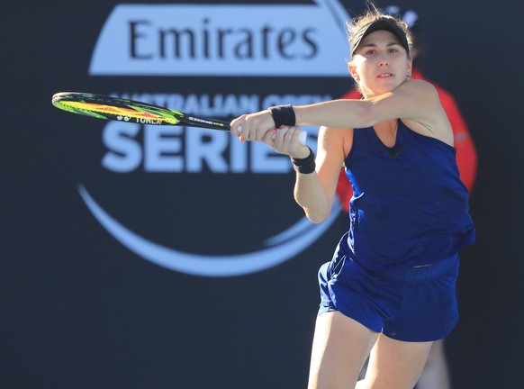 epa07274622 Belinda Bencic of Switzerland in action against Anna Karolina Schmiedlova of Slovakia during the singles semifinals at the Hobart International tennis tournament at Domain Tennis Centre in ...