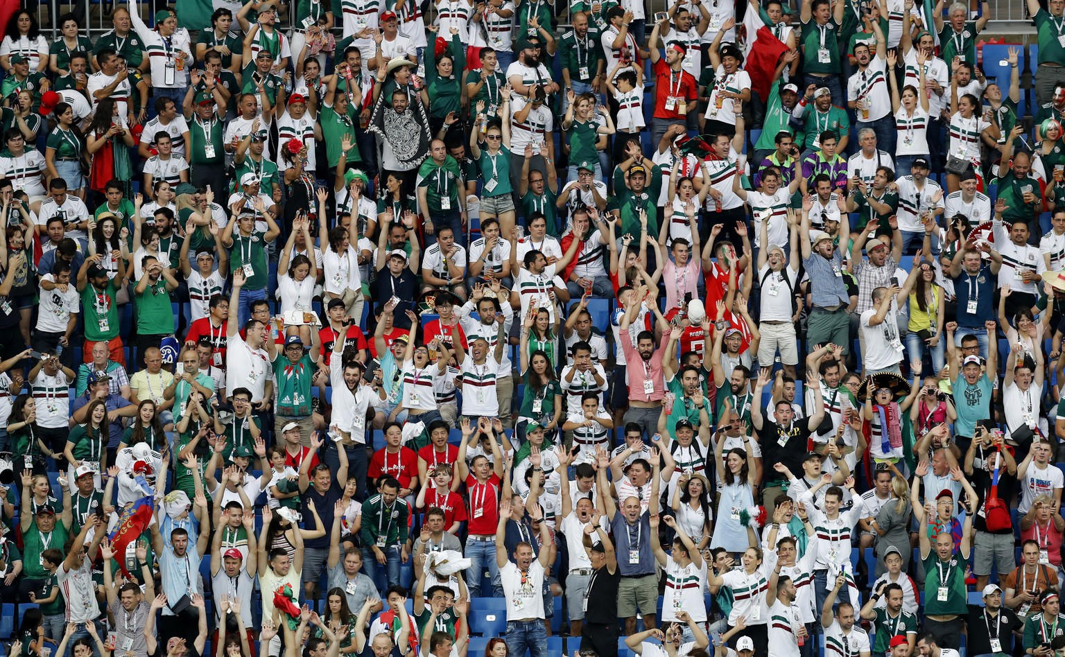 Mexico supporters cheer their team during the group F match between Mexico and South Korea at the 2018 soccer World Cup in the Rostov Arena in Rostov-on-Don, Russia, Saturday, June 23, 2018. (AP Photo ...