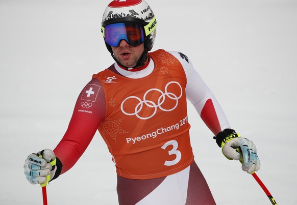 Switzerland&#039;s Beat Feuz looks up after finishing men&#039;s downhill training at the 2018 Winter Olympics in Jeongseon, South Korea, Saturday, Feb. 10, 2018. (AP Photo/Christophe Ena)