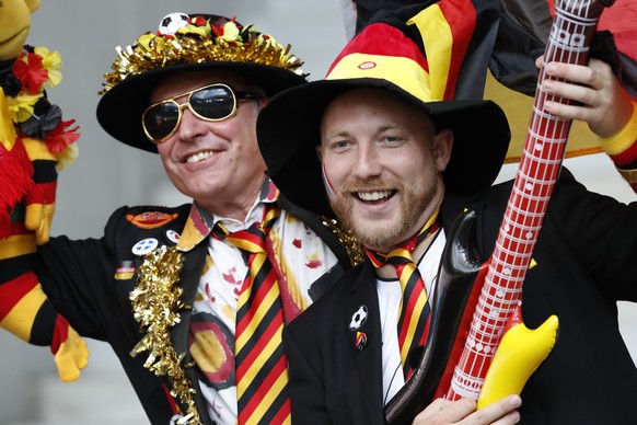 German fans wait for the start of the Euro 2016 round of 16 soccer match between Germany and Slovakia, at the Pierre Mauroy stadium in Villeneuve d'Ascq, near Lille, France, Sunday, June 26, 2016. (AP Photo/ Michel Spingler)