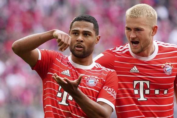 Bayern&#039;s Serge Gnabry, left, celebrates besides team mate Bayern&#039;s Matthijs de Ligt after scoring his side&#039;s opening goal during the German Bundesliga soccer match between FC Bayern Mun ...