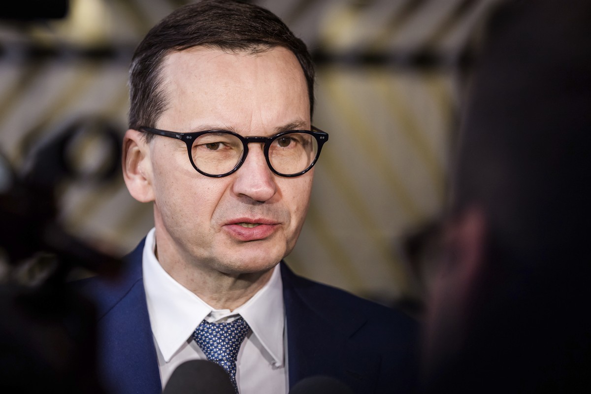 Poland's Prime Minister Mateusz Morawiecki speaks to media before the second day's session of an extraordinary meeting of EU leaders to discuss Ukraine, energy and food security at the Europ ...