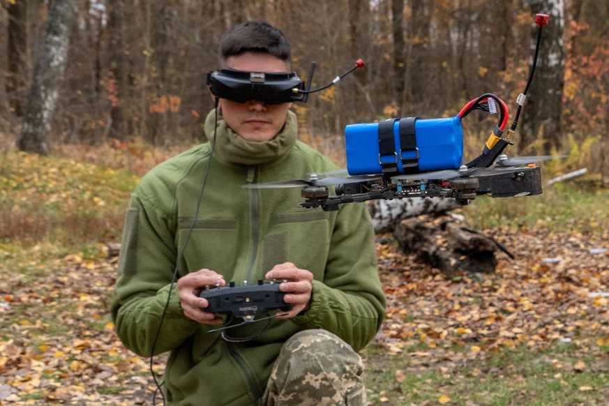A serviceman of Ukraine's 72nd motorized brigade checks an FPV drone at the frontline in Kharkiv region, Ukraine, Wednesday, Oct. 29, 2025. (AP Photo/Andrii Marienko)
Russia Ukraine War