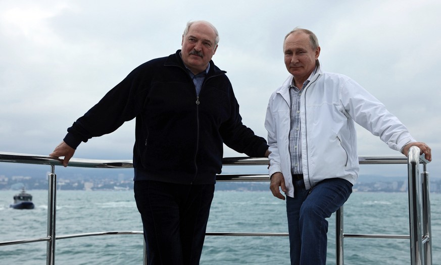 epa09235367 Russian President Vladimir Putin (R) speaks with Belarusian President Alexander Lukashenko (L) during their informal meeting in Sochi, Russia, 29 May 2021. This is the third meeting in a y ...