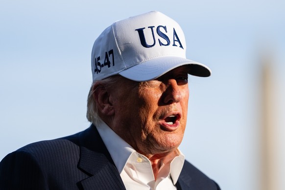 epa12961866 U.S. President Donald Trump speaks to members of the media on the South Lawn of the White House after arriving on Marine One in Washington, DC, USA, 15 May 2026. EPA/Eric Lee / POOL
