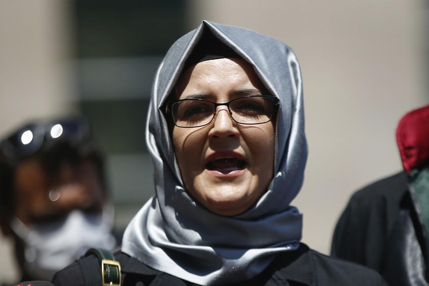 FILE - In this July 3, 2020, file photo, Hatice Cengiz, the fiancee of slain Saudi journalist Jamal Khashoggi, talks to members of the media in Istanbul. Amnesty International reported that its forens ...