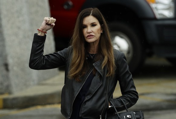 Former model Janice Dickinson gestures outside the Montgomery County Courthouse during Bill Cosby's sentencing hearing, Tuesday, Sept. 25, 2018, in Norristown, Pa. (AP Photo/Matt Slocum)