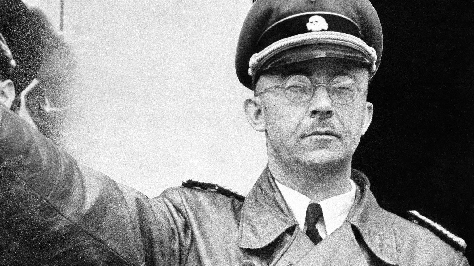 FILE - The undated file photo shows German Nazi party official and head of the SS, Heinrich Himmler. at unknown location in Germany. German newspaper Welt am Sonntag has published a trove of letters b ...