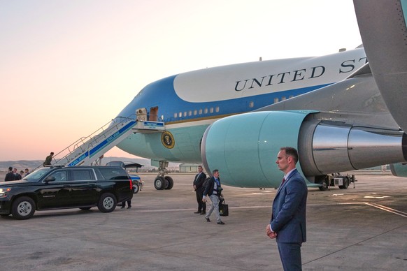 A catering truck is visible parked on the opposite side of Air Force One on the tarmac before U.S. President Donald Trump departs following the NATO summit at Ankara International Airport in Ankara, T ...