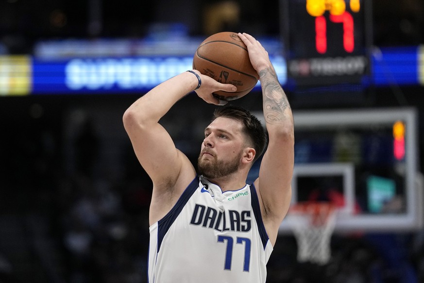 Dallas Mavericks guard Luka Doncic attempts a shot in the first half of an NBA basketball game against the Oklahoma City Thunder, Monday, Dec. 12, 2022, in Dallas. (AP Photo/Tony Gutierrez)
Luka Donci ...