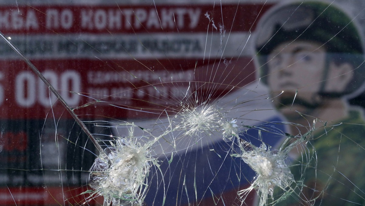 epa10669315 A billboard depicting a soldier, with a slogan reading 'Contract service. A real man's job', in St. Petersburg, Russia, 02 June 2023. On 24 February 2022, Russian troops ent ...